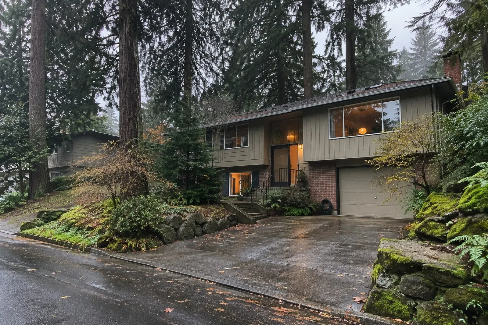 Split-level home on a wet, tree-lined street in the Southwest Portland neighborhoods near PCC Sylvania