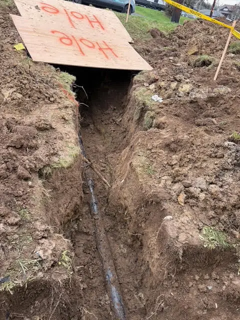 Open trench for an underground water service line repair by Wild Pine Plumbing in Columbia County, OR