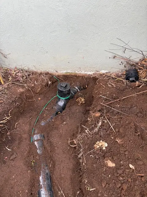 Exposed water service shutoff and supply line repair in an open trench by Wild Pine Plumbing in Columbia County, OR